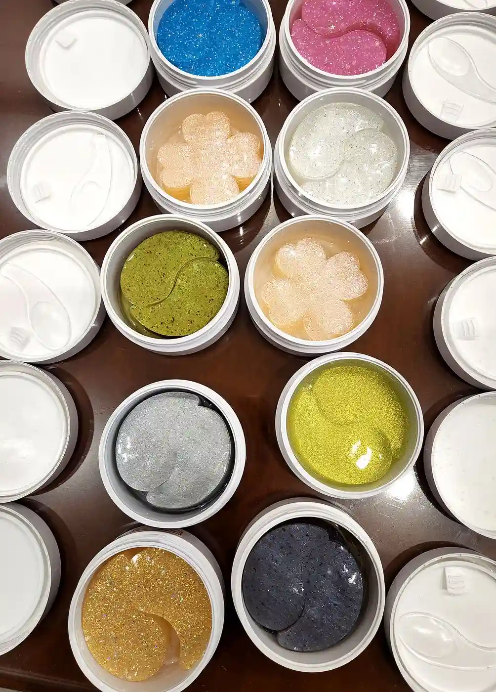 Colorful hydrogel eye patches in jars, developed in Korea by B4 LAB